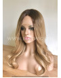 Synthetic lace front wig Wavy rooted caramel blonde / middle parting