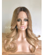 Synthetic lace front wig Wavy rooted caramel blonde / middle parting